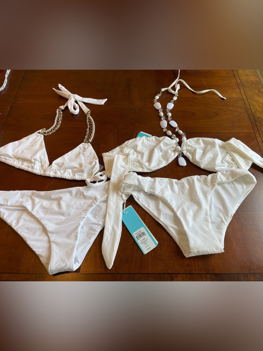 Two sets of bridal white pearl beach bunny bikinis tops L, bottoms XL
